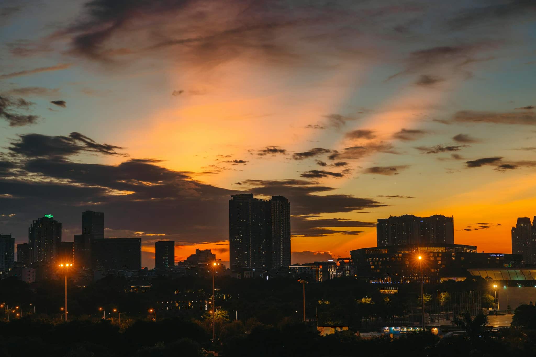 A city skyline glowing at dusk