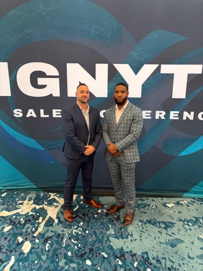 Chris Island with Salim Hamideh, Director of Agent Development, at the IGNYTE sales conference
